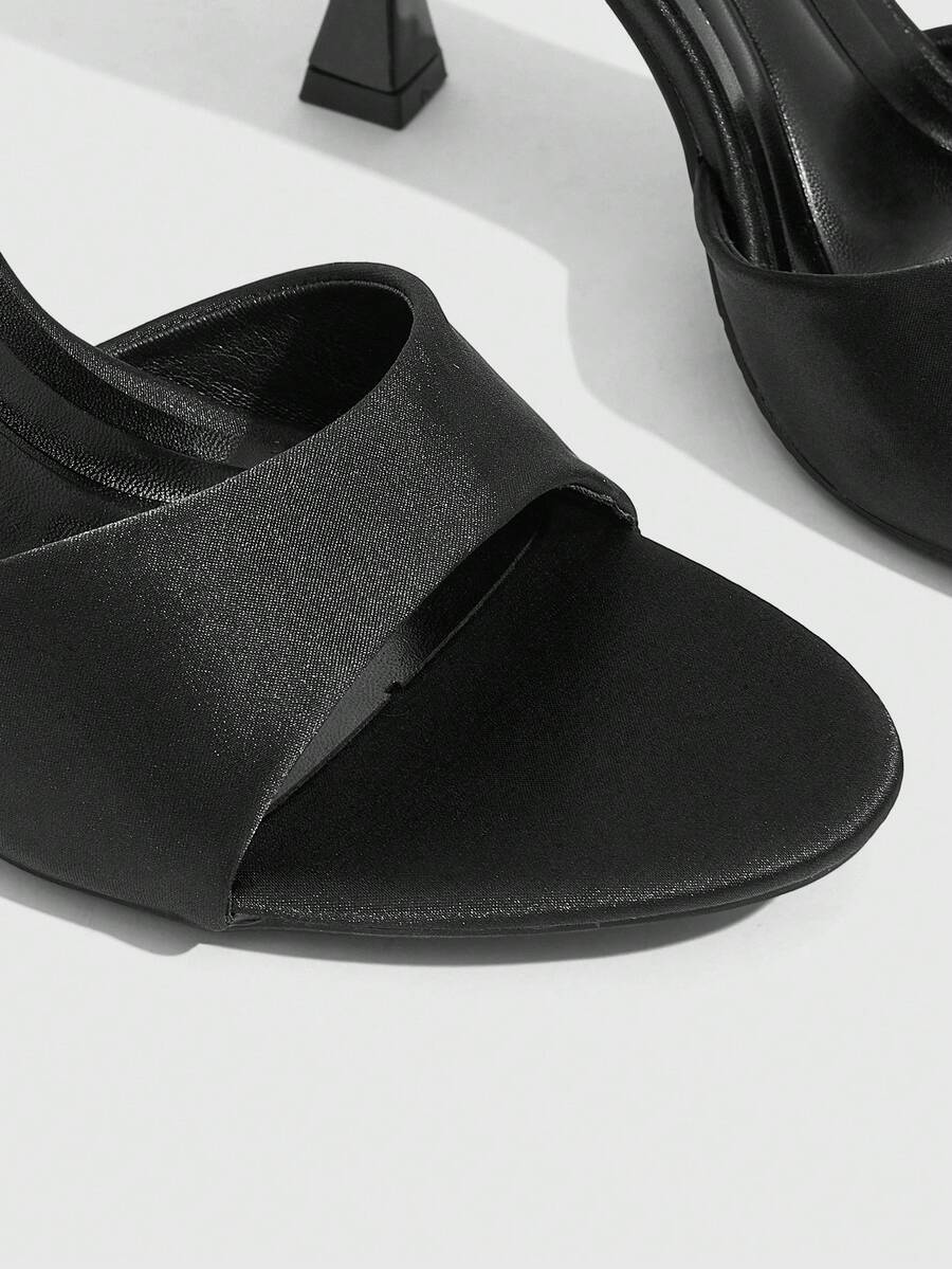 Women's open toe high heel sandals with slingback strap and sleek stiletto heel in smooth PU leather.