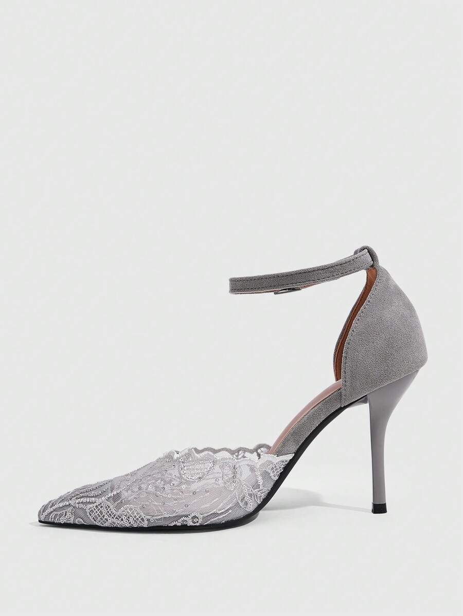 Women's stiletto high heel shoes featuring an elegant buckle detail and ankle strap slingback design.
