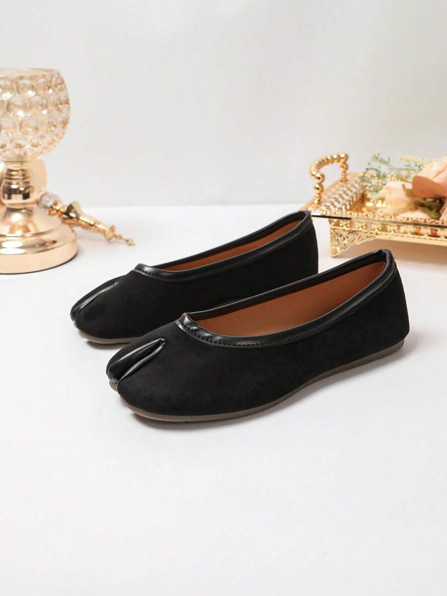 Women's white split-toe slip-on flat shoes with braided accent and rubber sole