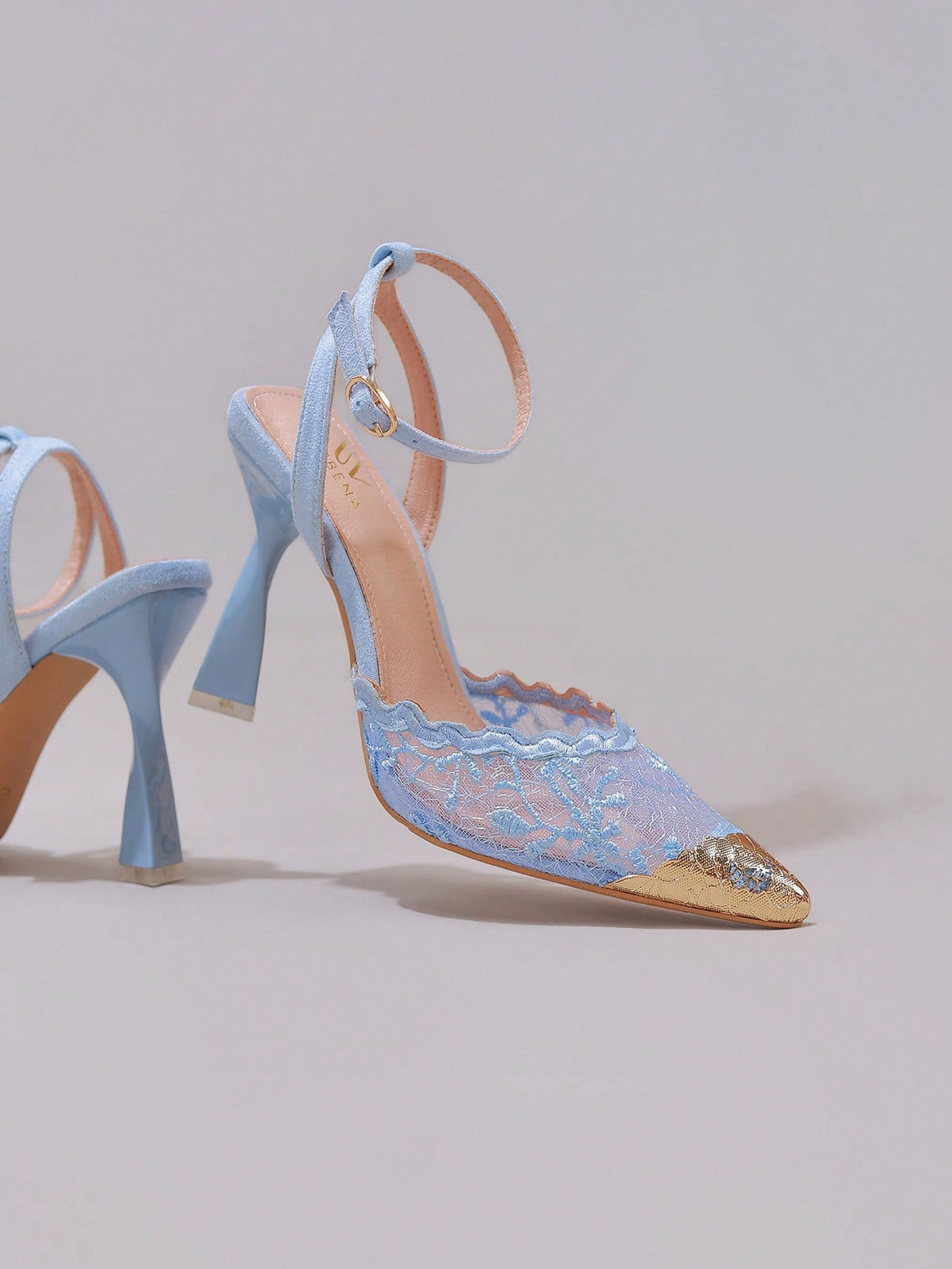 White pointed toe high heel stiletto sandals featuring lace patchwork, fringe trim, and an oversized bowknot accent.