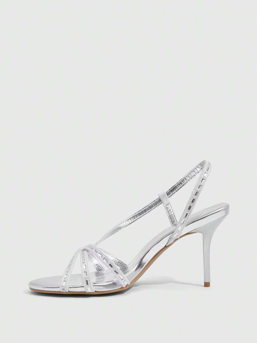 Women's open toe stiletto heel sandals featuring square toe design, criss-cross rhinestone slim straps, and secure ankle strap.