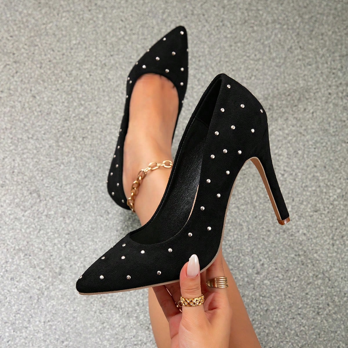 Women's color block pointed toe stiletto high heel pumps featuring an adjustable slingback buckle strap and denim upper.