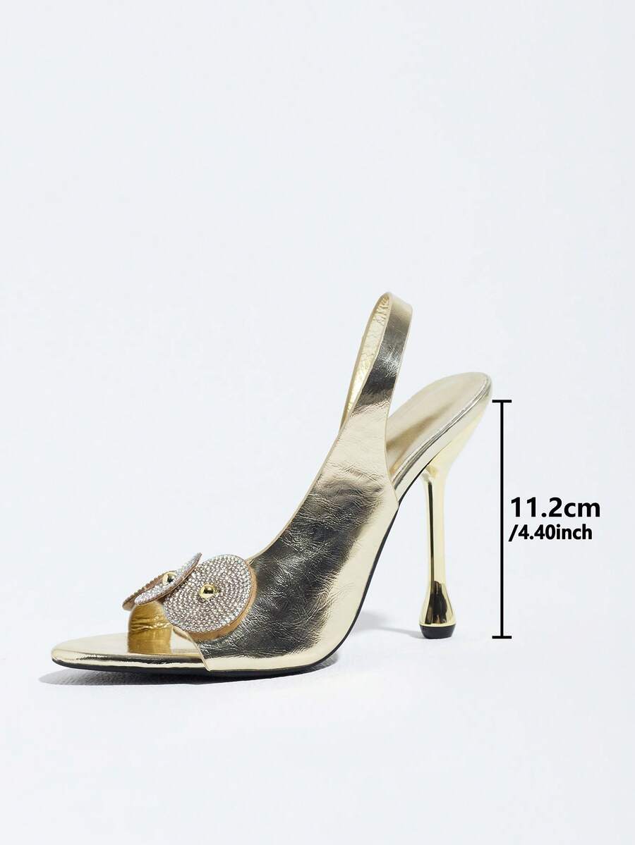 Women's stiletto high heel sandals with sparkling vine-shaped rhinestone ankle strap embellishments and open pointed toe design.