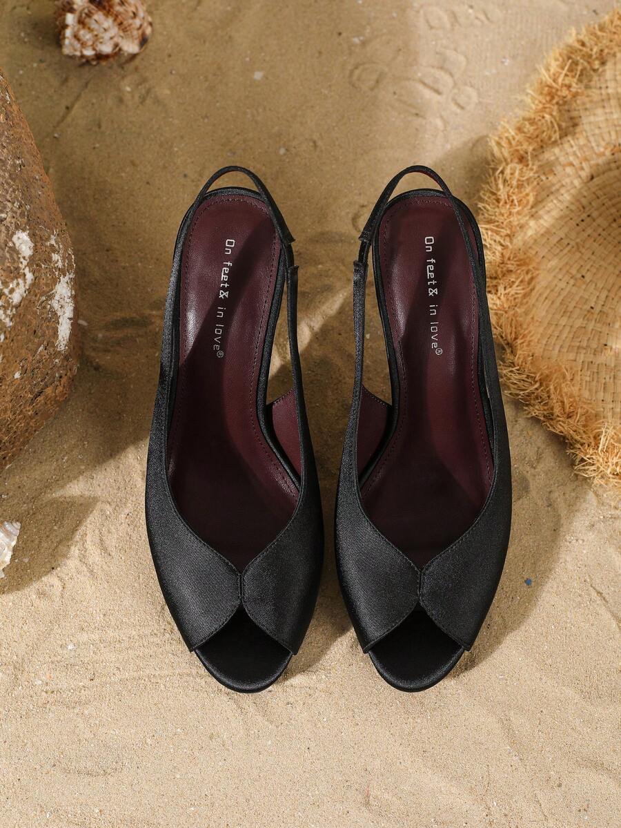 Women's peep toe satin high heel pumps featuring micro V hollow cut design, stiletto heels, and slingback strap.