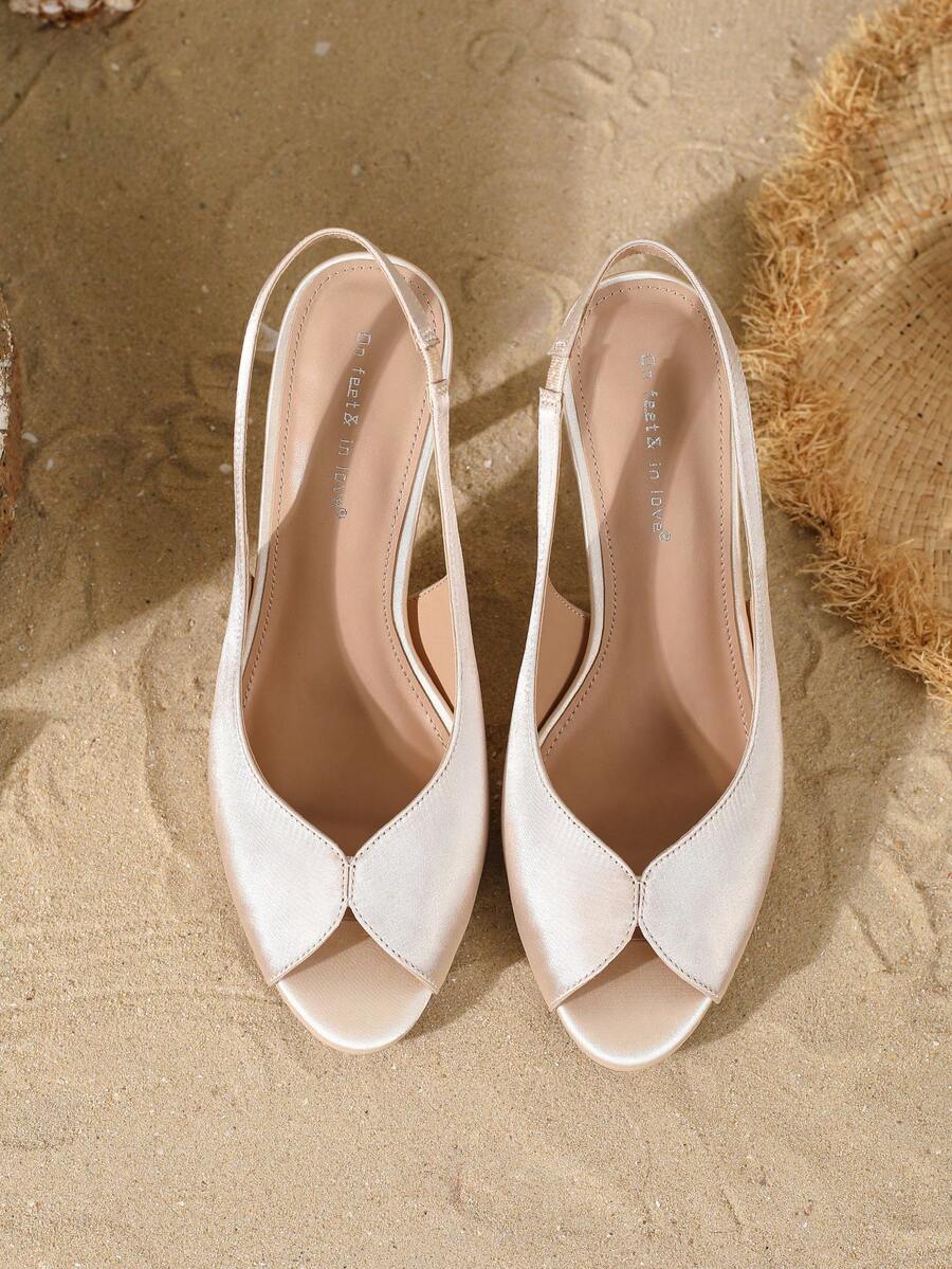 Women's peep toe satin high heel pumps featuring micro V hollow cut design, stiletto heels, and slingback strap.