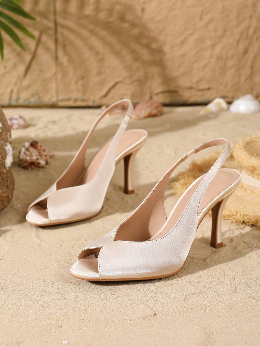 Women's peep toe satin high heel pumps featuring micro V hollow cut design, stiletto heels, and slingback strap.