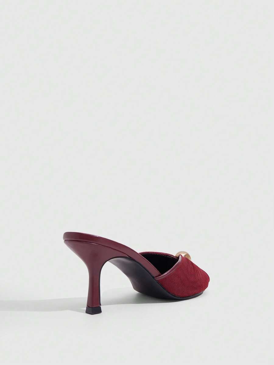 Pair of women's open toe kitten heel sandals and mules in sleek PU leather with rubber soles.