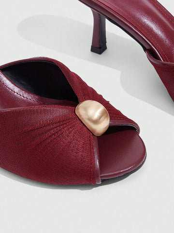 Pair of women's open toe kitten heel sandals and mules in sleek PU leather with rubber soles.