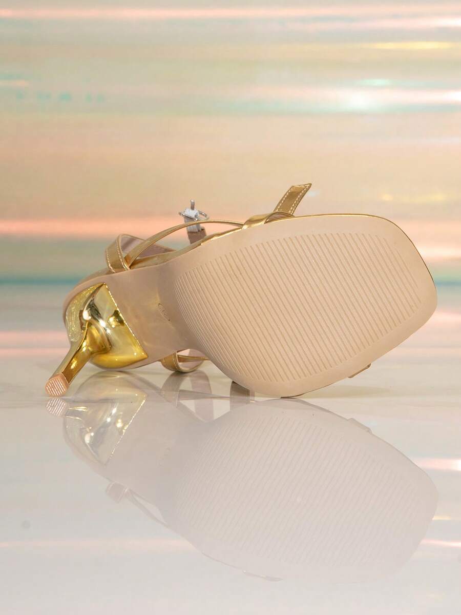 Women's stiletto high heel thong sandals featuring a T-strap toe loop design and ankle buckle strap
