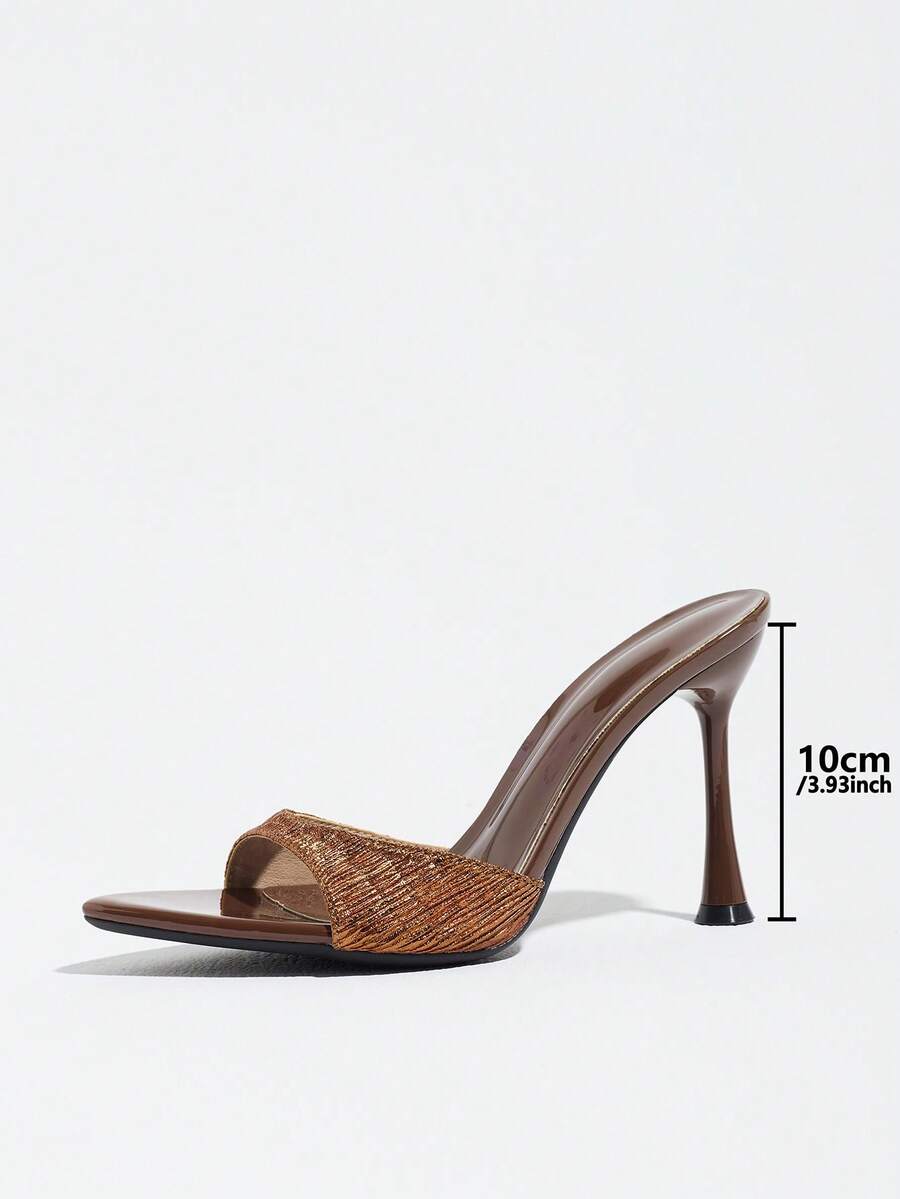Women's coffee brown high heel mule shoes featuring a glossy mirror finish, open toe design, and sleek stiletto heel.