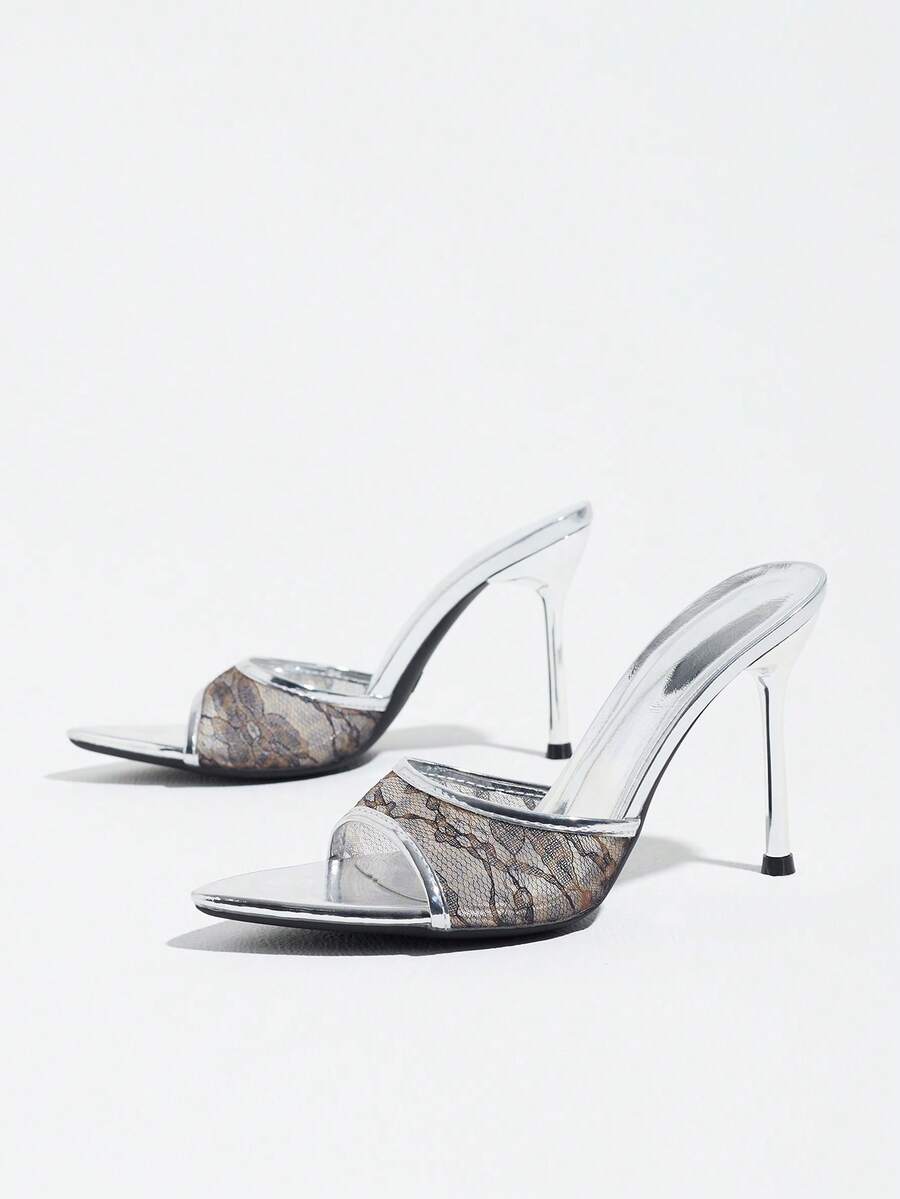 Women's elegant open toe high heel party mules featuring sleek stiletto heels and a slip-on design.