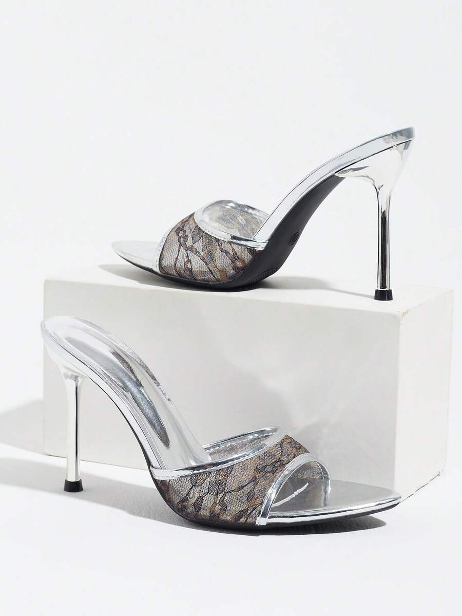 Women's elegant open toe high heel party mules featuring sleek stiletto heels and a slip-on design.