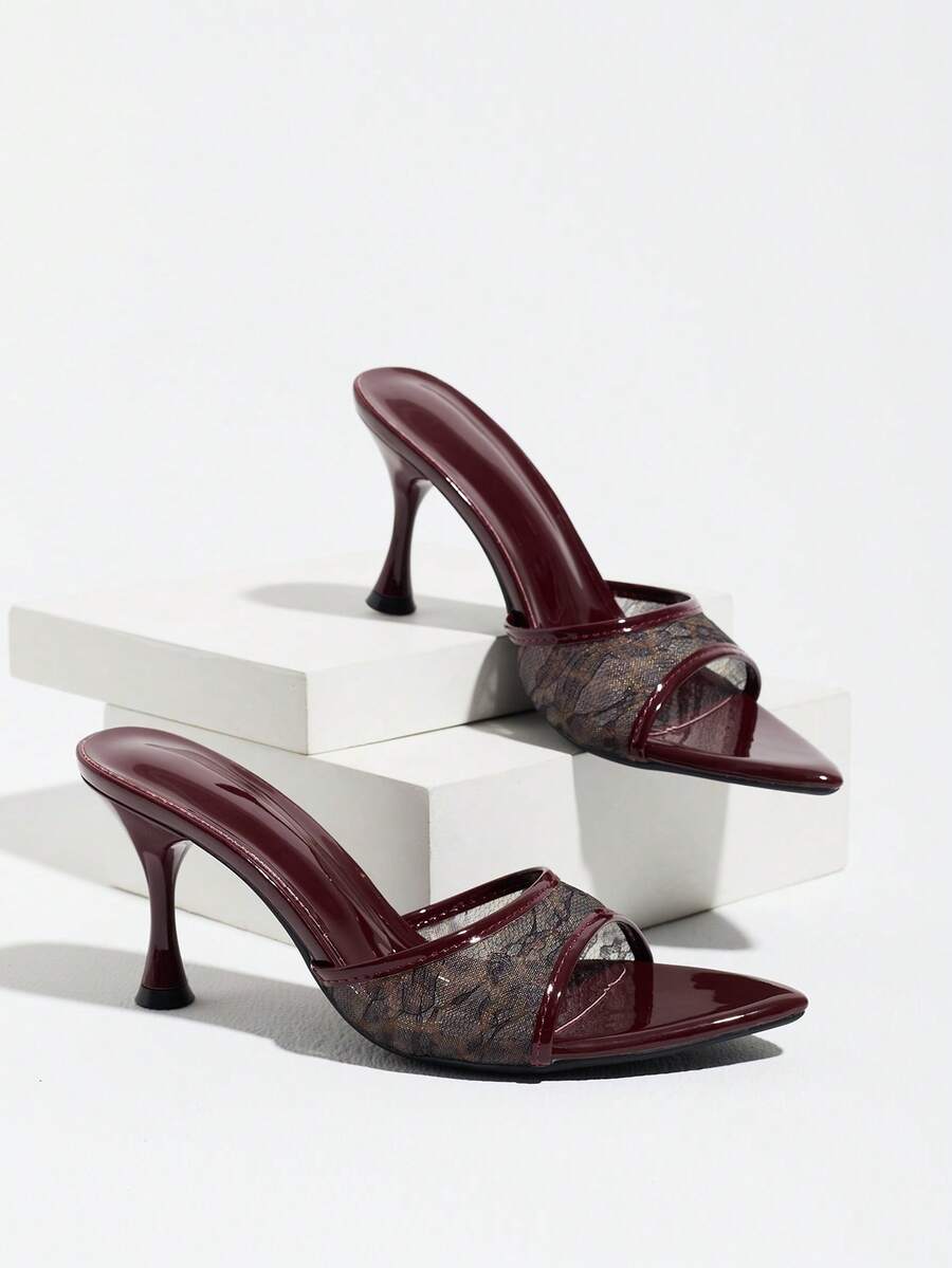 Women's open pointed toe stiletto mule high heel sandals featuring a glossy slip-on design.