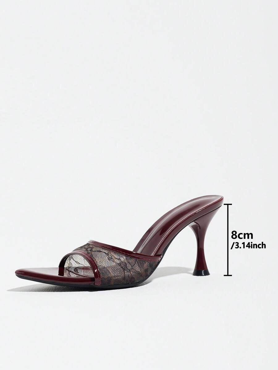 Women's open pointed toe stiletto mule high heel sandals featuring a glossy slip-on design.