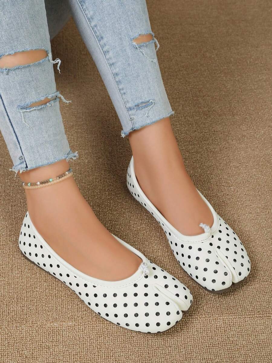 Women's white split-toe slip-on flat shoes with braided accent and rubber sole