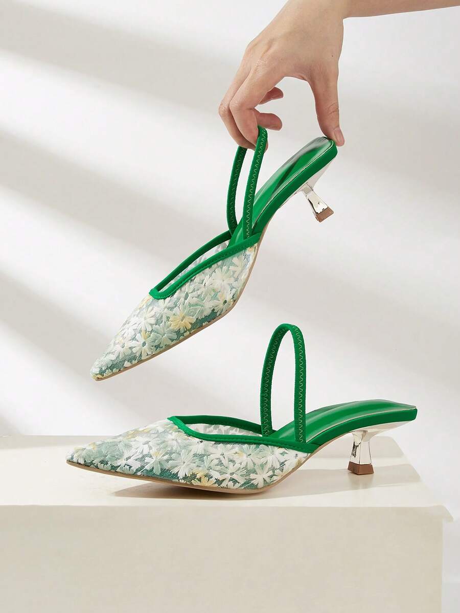 Women's pointed toe kitten heel pumps with leopard print suedette finish and slingback back strap.