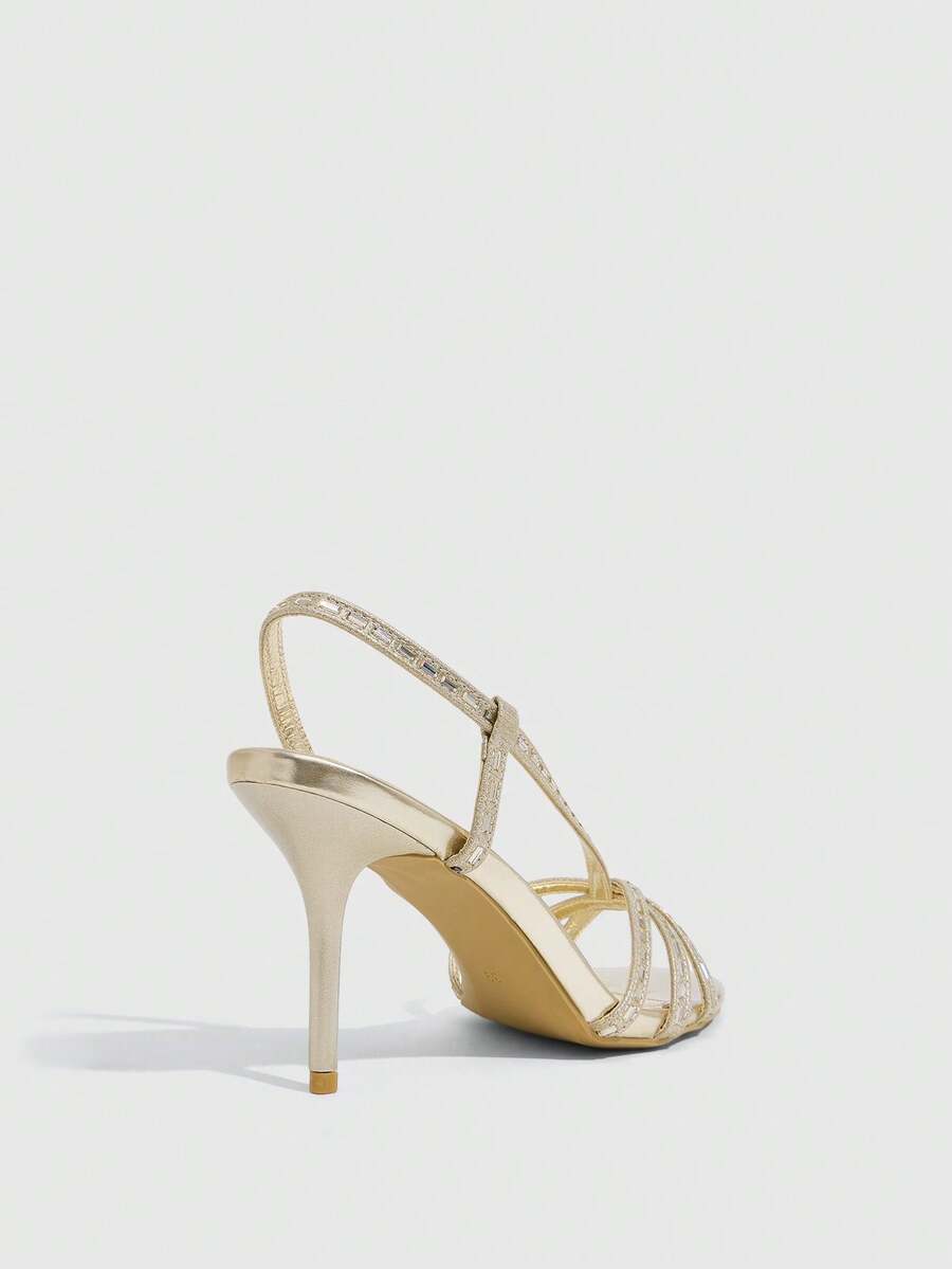 Women's open toe stiletto heel sandals featuring square toe design, criss-cross rhinestone slim straps, and secure ankle strap.