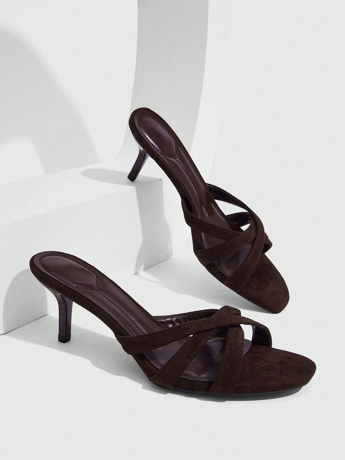 Square toe gold metallic heel sandals for women featuring open toe, crossover slingback strap, and stiletto mid heel for weddings and parties.