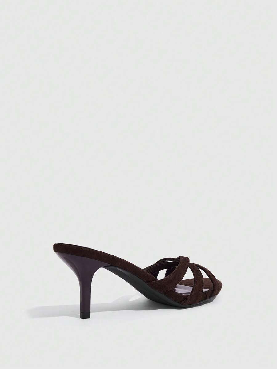 Square toe gold metallic heel sandals for women featuring open toe, crossover slingback strap, and stiletto mid heel for weddings and parties.