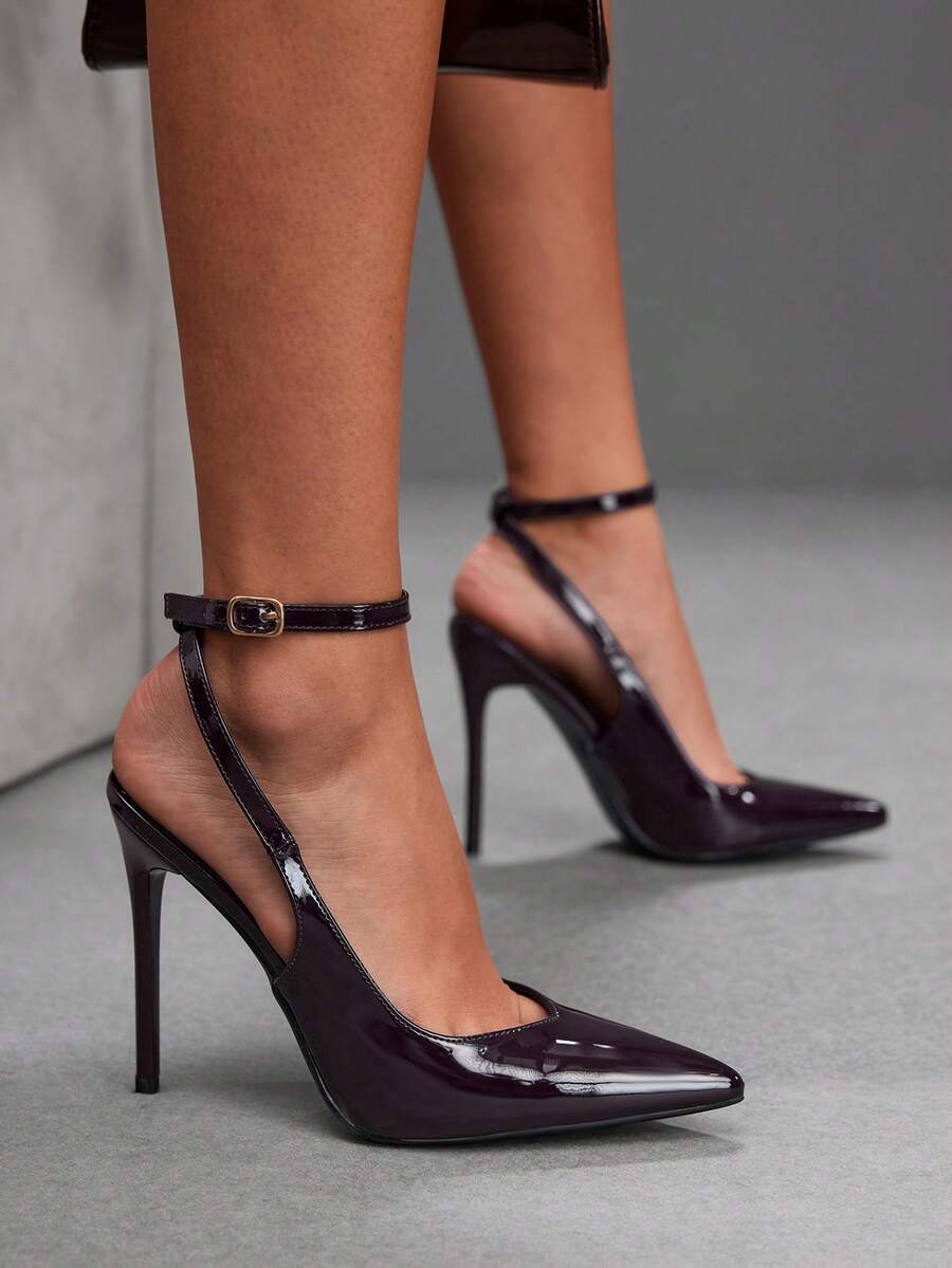 Pointed toe stiletto high heels with slingback silhouette and adjustable buckle ankle strap.