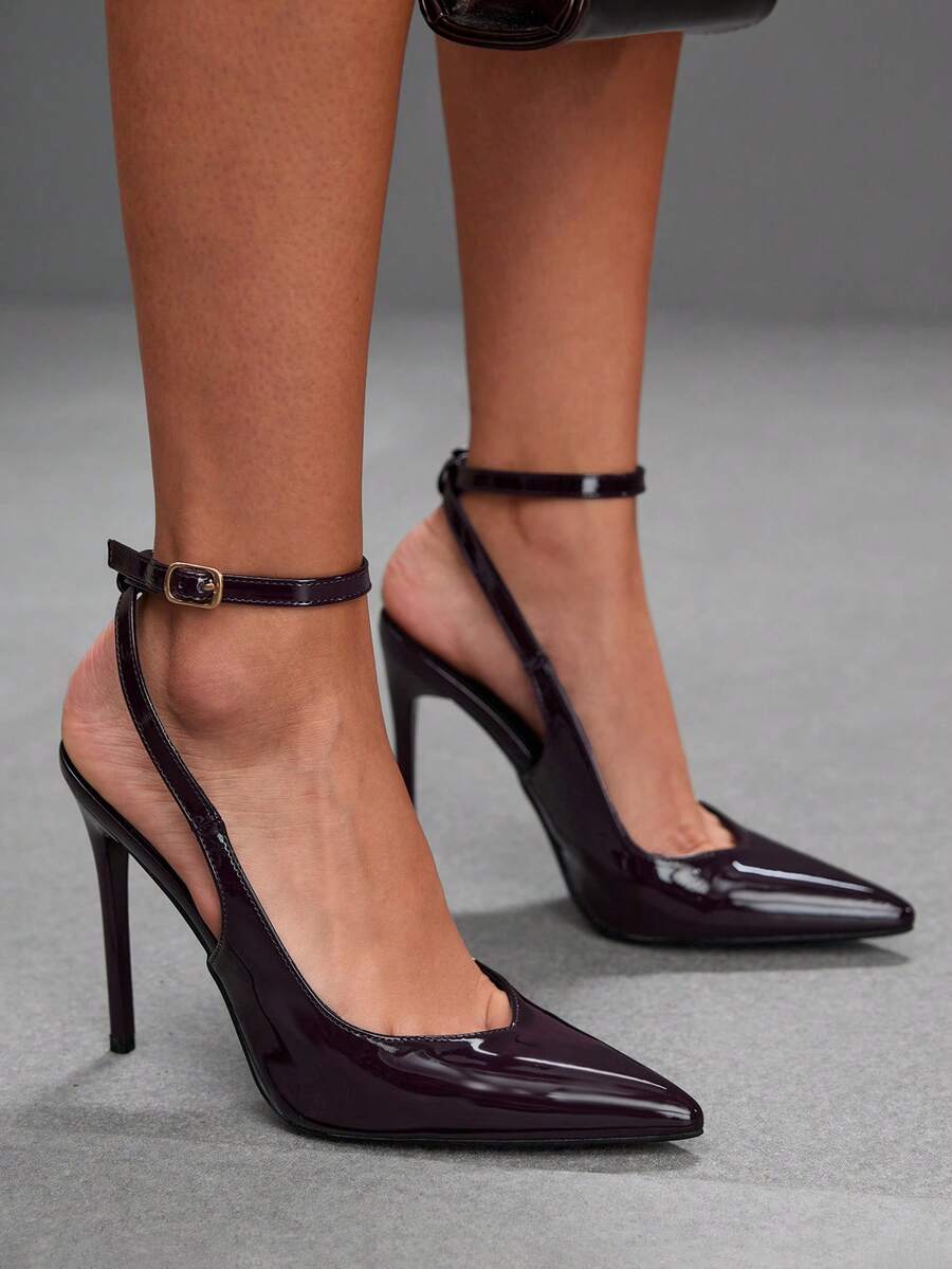 Pointed toe stiletto high heels with slingback silhouette and adjustable buckle ankle strap.