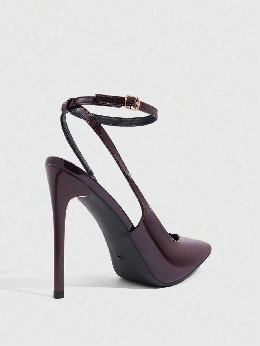 Pointed toe stiletto high heels with slingback silhouette and adjustable buckle ankle strap.