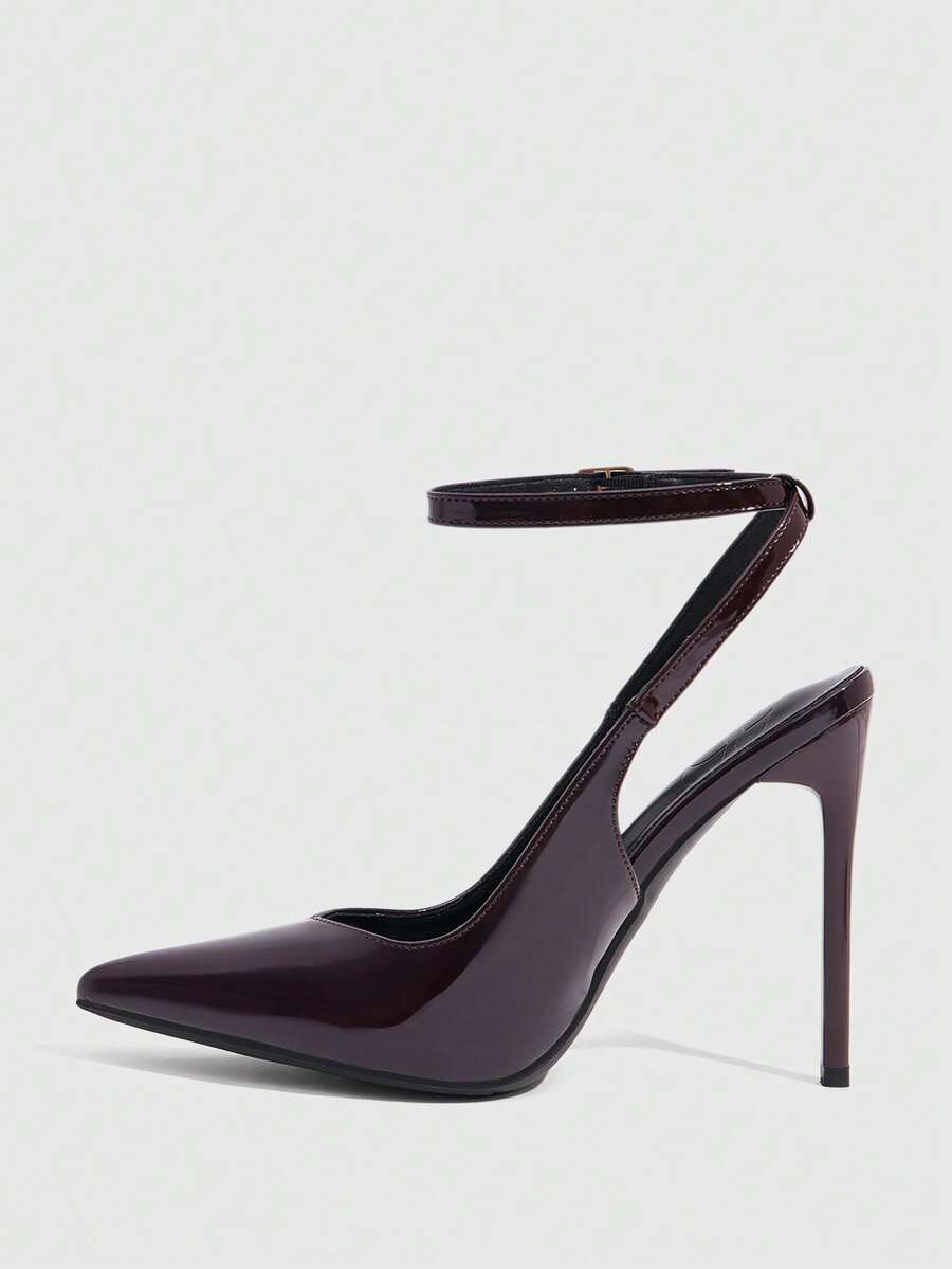 Pointed toe stiletto high heels with slingback silhouette and adjustable buckle ankle strap.