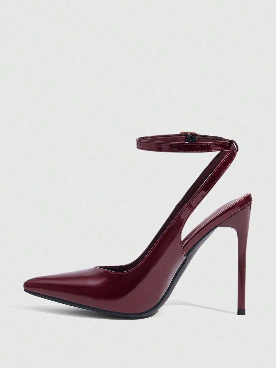 Pointed toe stiletto high heels with slingback silhouette and adjustable buckle ankle strap.