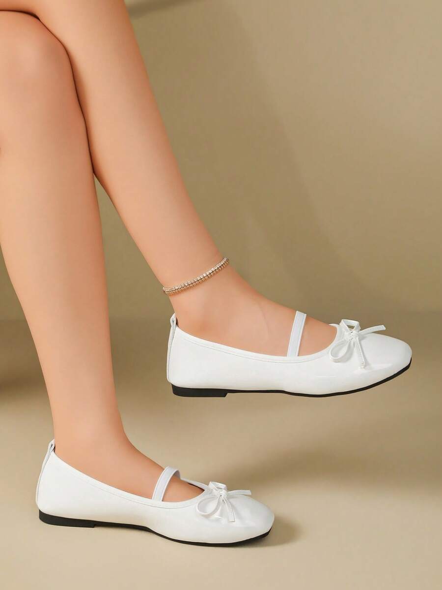 Square toe ballet flat shoes with bow detail and slip-on wide fit design.
