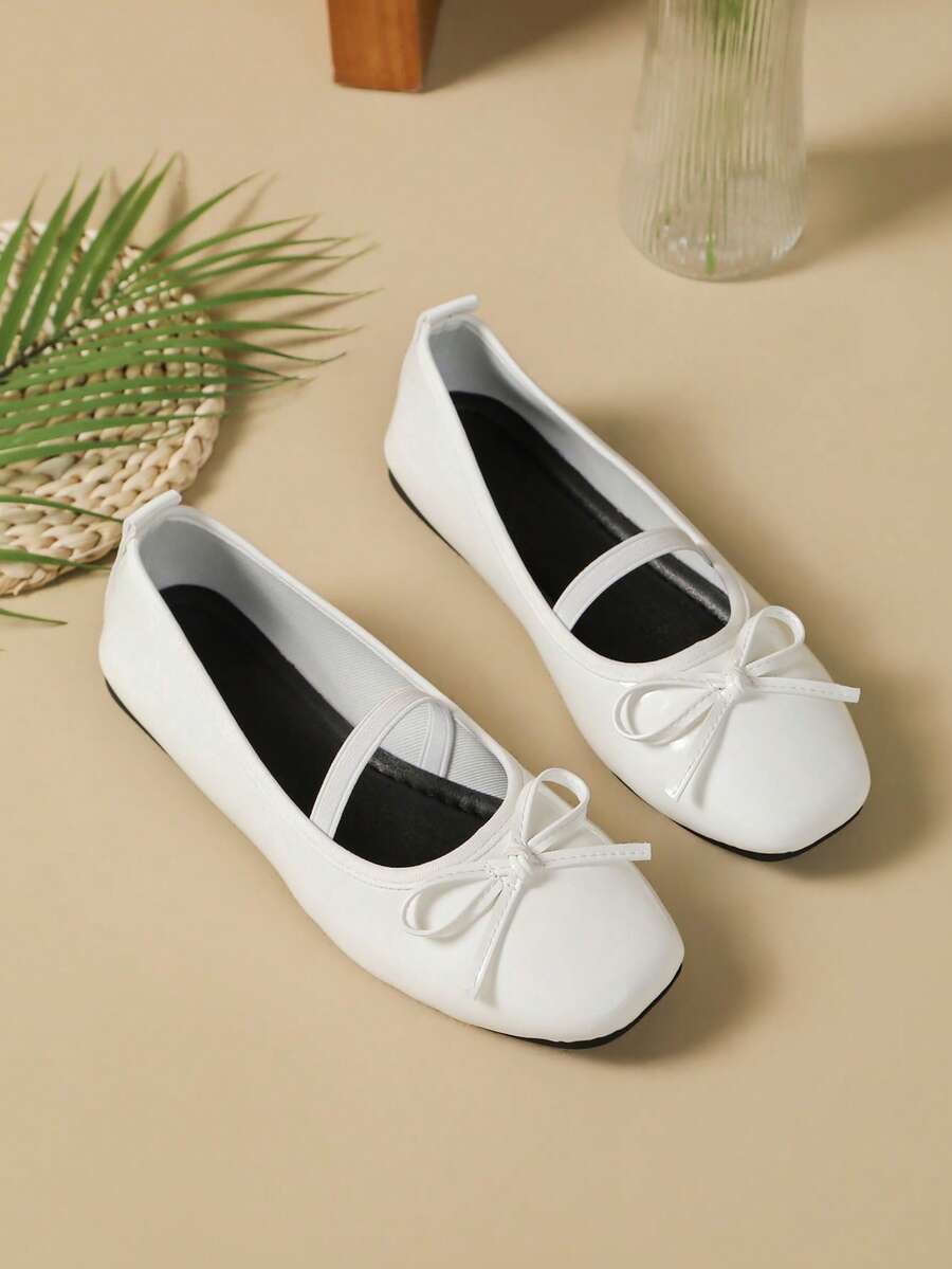 Square toe ballet flat shoes with bow detail and slip-on wide fit design.
