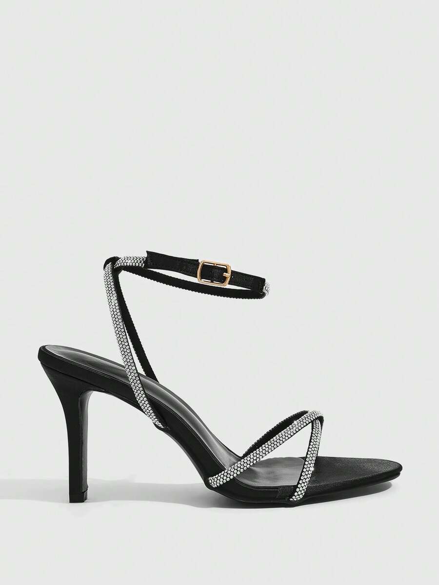 Women's open toe stiletto heel sandals featuring square toe design, criss-cross rhinestone slim straps, and secure ankle strap.