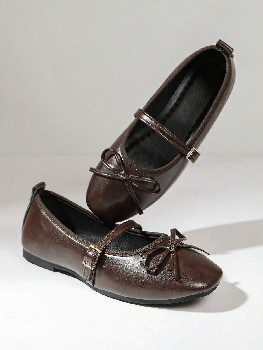 Square toe ballet flat shoes with bow detail and slip-on wide fit design.