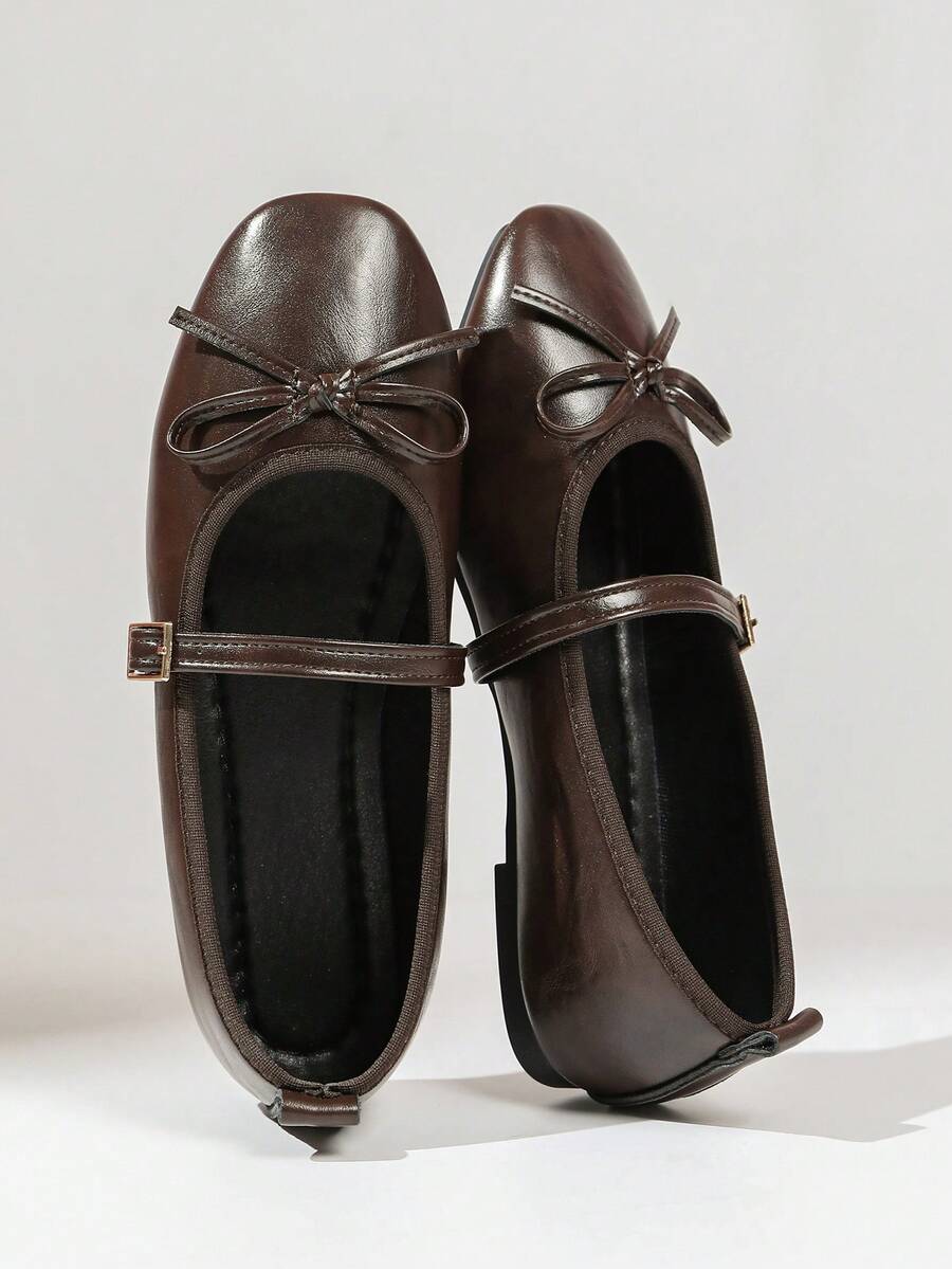 Square toe ballet flat shoes with bow detail and slip-on wide fit design.
