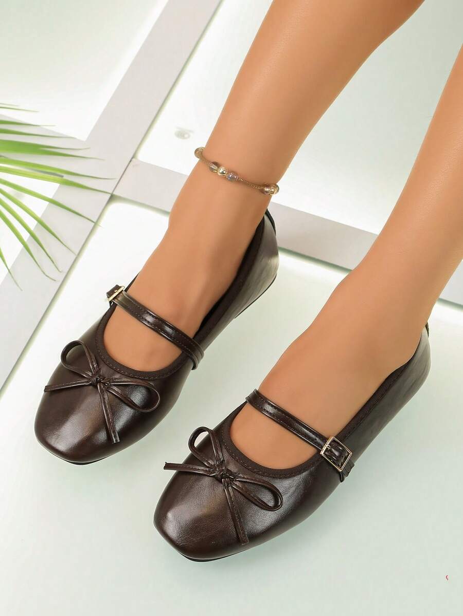 Square toe ballet flat shoes with bow detail and slip-on wide fit design.