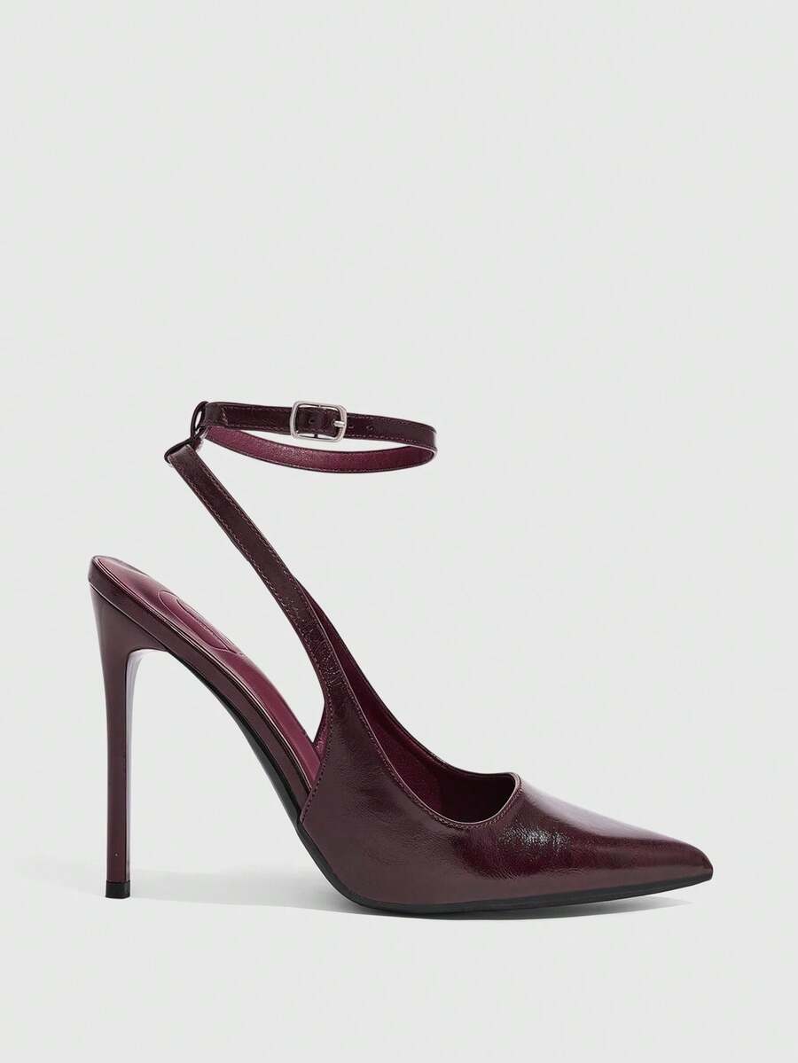 Pointed toe stiletto high heels with slingback silhouette and adjustable buckle ankle strap.
