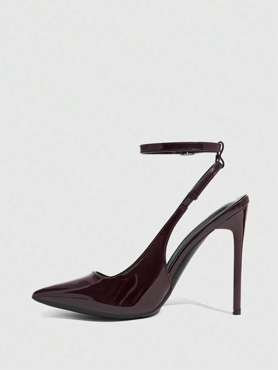 Pointed toe stiletto high heels with slingback silhouette and adjustable buckle ankle strap.