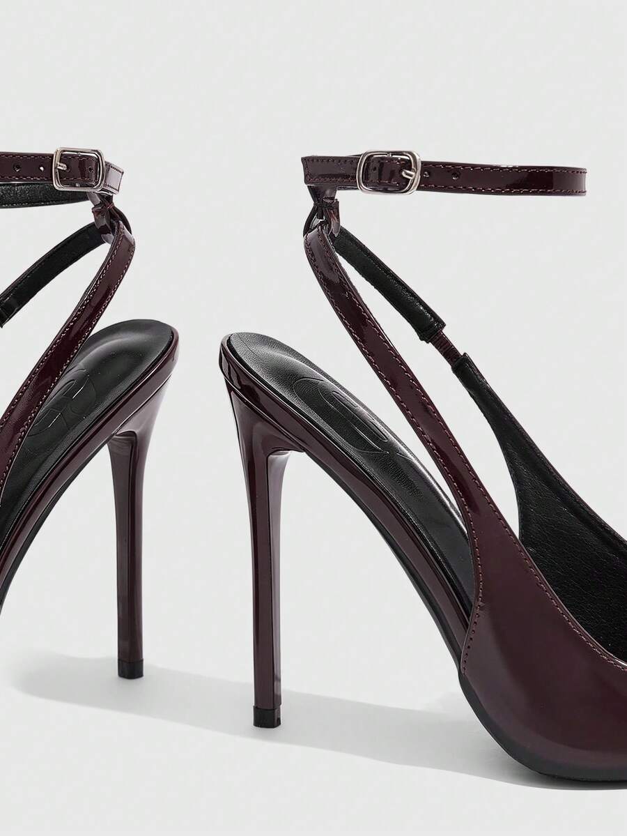 Pointed toe stiletto high heels with slingback silhouette and adjustable buckle ankle strap.