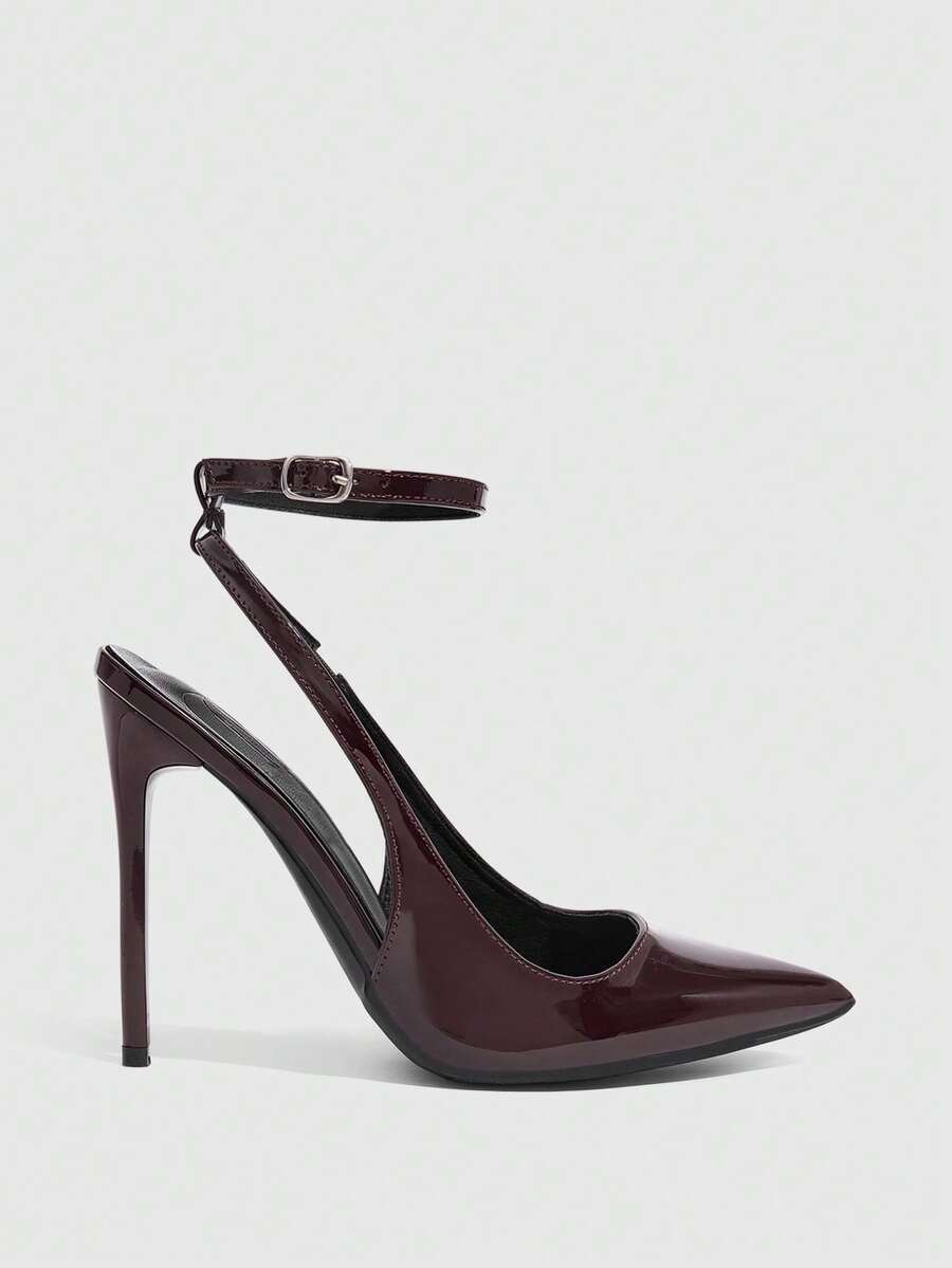 Pointed toe stiletto high heels with slingback silhouette and adjustable buckle ankle strap.