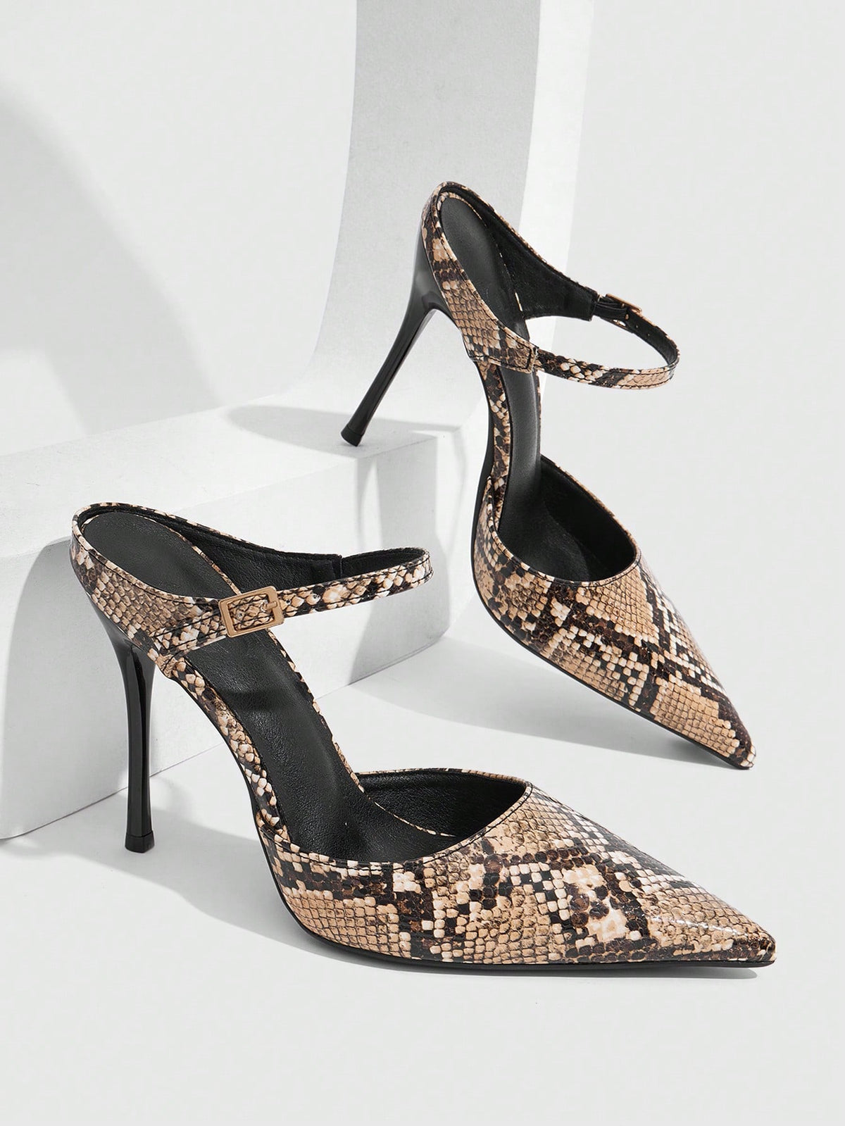 Burgundy pointed toe stiletto high heels with ankle strap buckle detail in patent PU leather