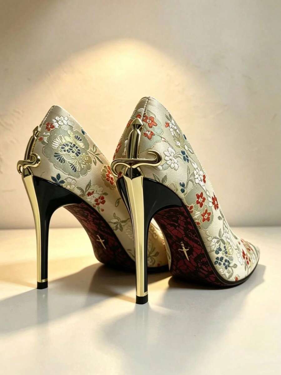 Glossy black pointed toe stiletto high heel pumps with bow detail for women