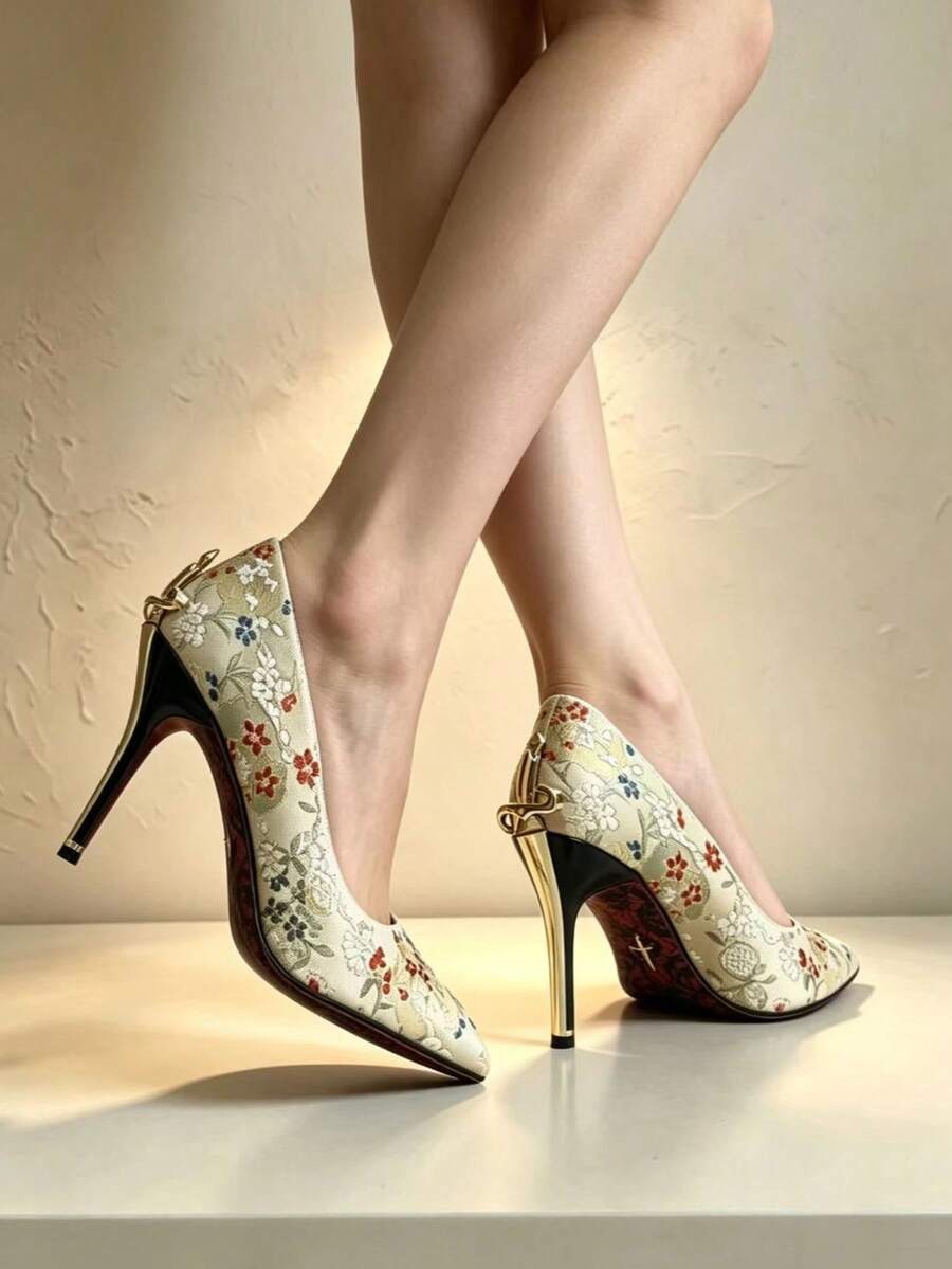 Glossy black pointed toe stiletto high heel pumps with bow detail for women