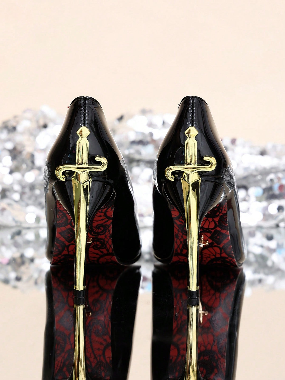 Glossy black pointed toe stiletto high heel pumps with bow detail for women