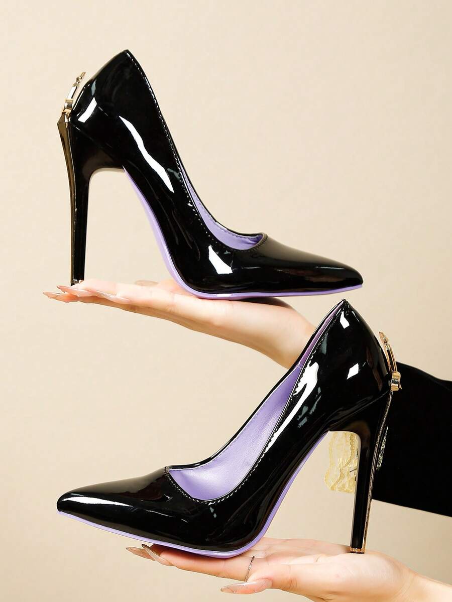 Glossy black pointed toe stiletto high heel pumps with bow detail for women