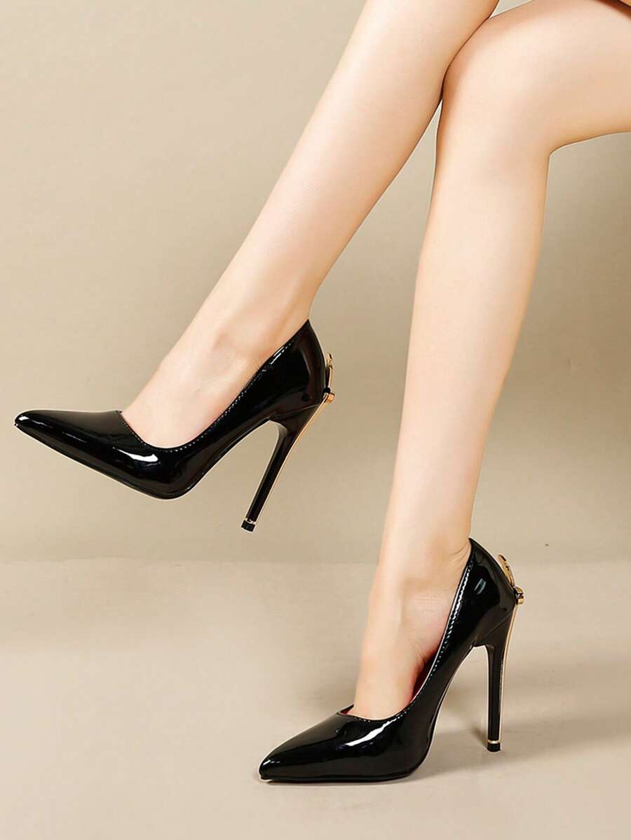 Glossy black pointed toe stiletto high heel pumps with bow detail for women