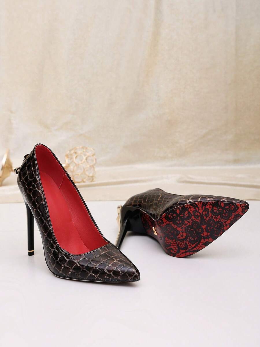 Glossy black pointed toe stiletto high heel pumps with bow detail for women