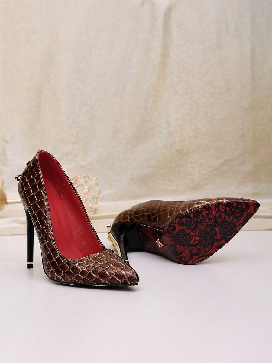 Glossy black pointed toe stiletto high heel pumps with bow detail for women
