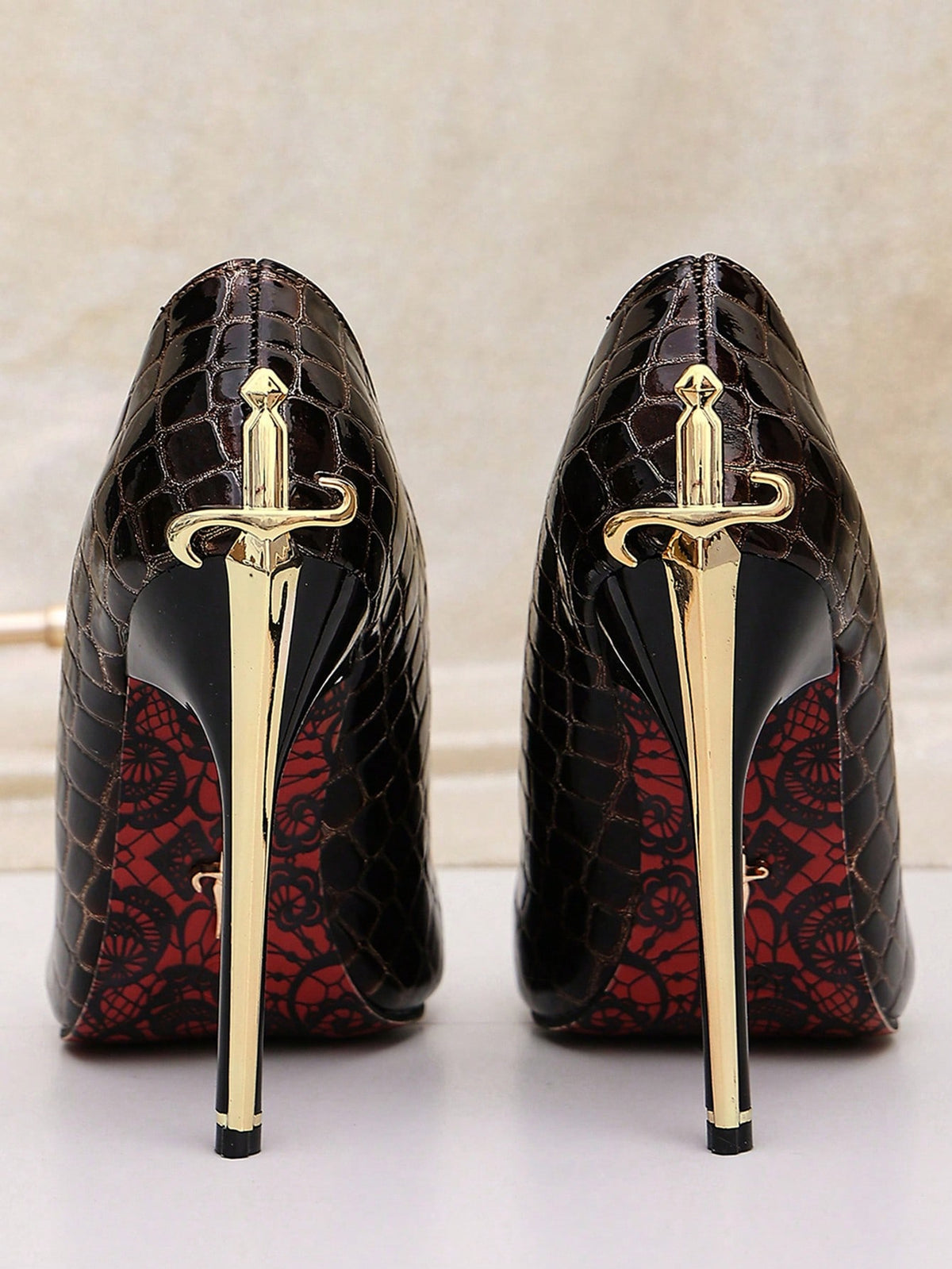 Glossy black pointed toe stiletto high heel pumps with bow detail for women