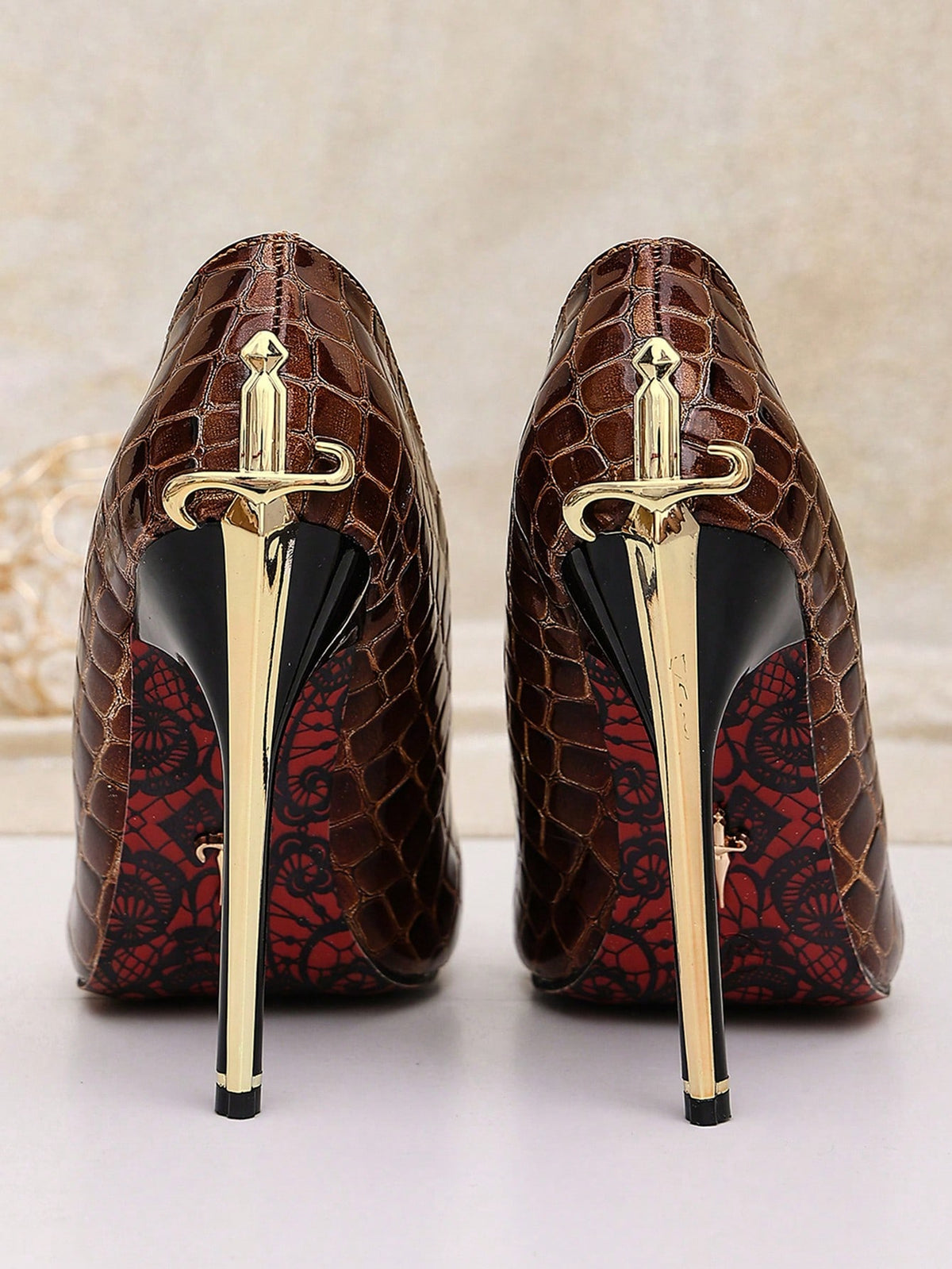 Glossy black pointed toe stiletto high heel pumps with bow detail for women