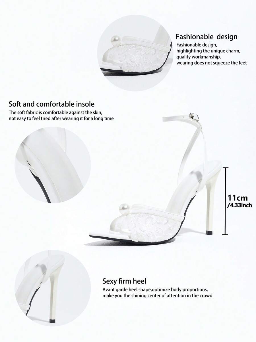 Burgundy open-toe high heels featuring an adjustable ankle strap with buckle closure and high stiletto heel.