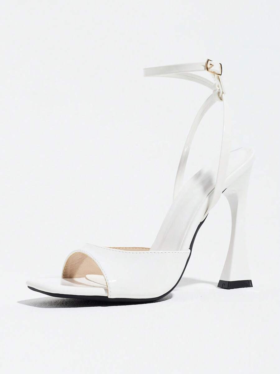 Burgundy women's square toe high heel sandals featuring a mesh bow accent and ankle strap buckle on an open toe silhouette